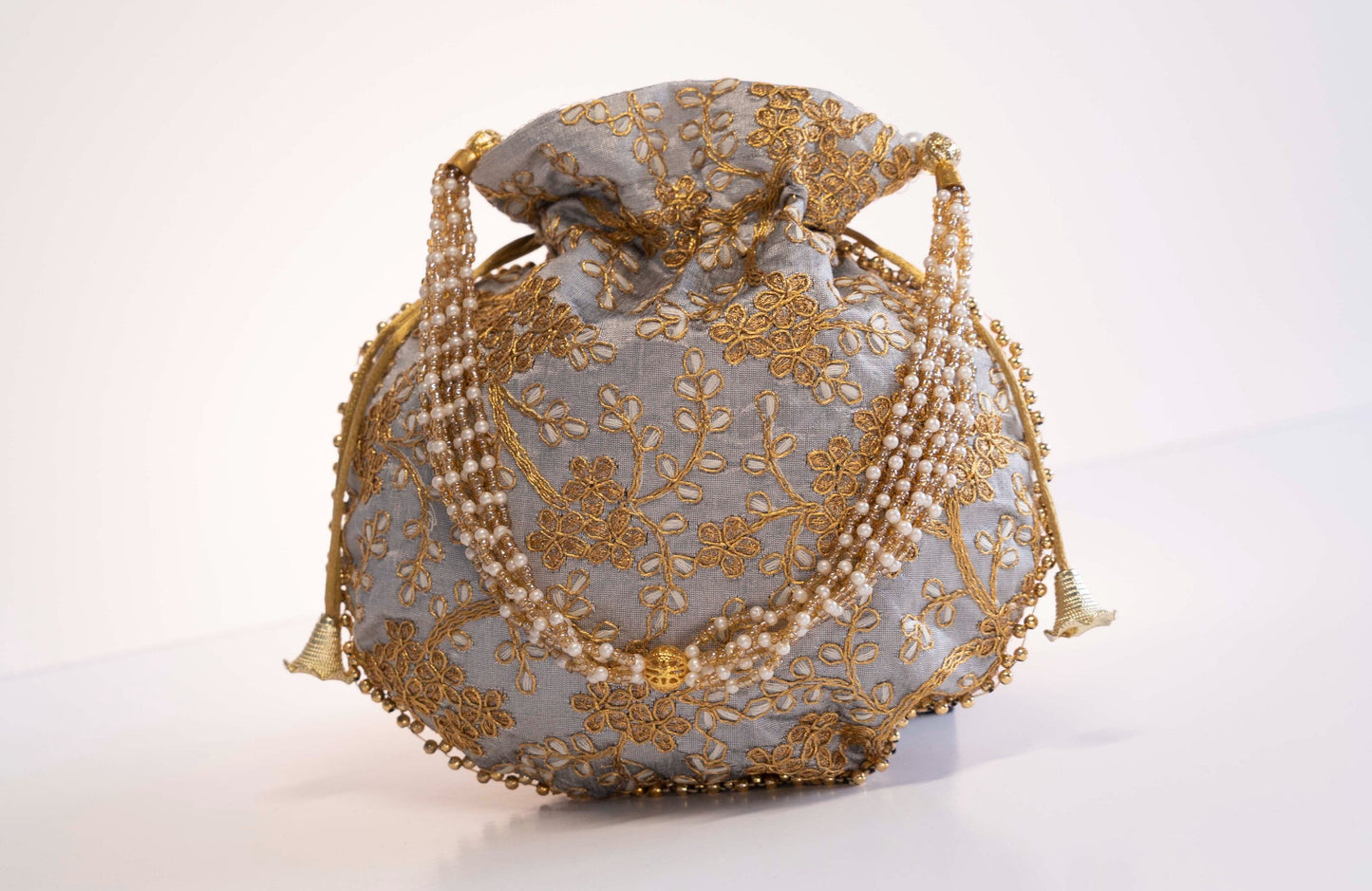 Nice Embroidery work potli bag for ladies