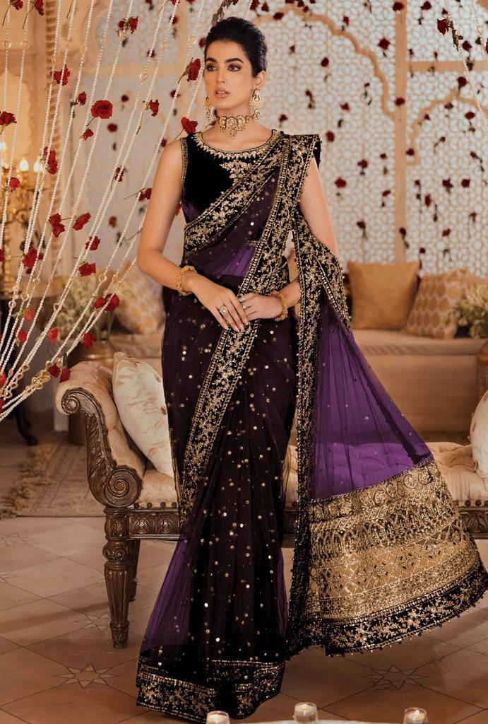 Purpled color garget sharee with stone work_