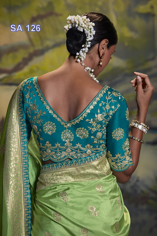 Fabric :- Pure Dola Silk       With Fancy Lace Border &       Embroidery Worked Blouse
