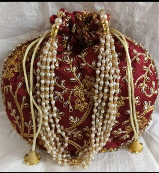 Nice Embroidery work potil bag for ladies